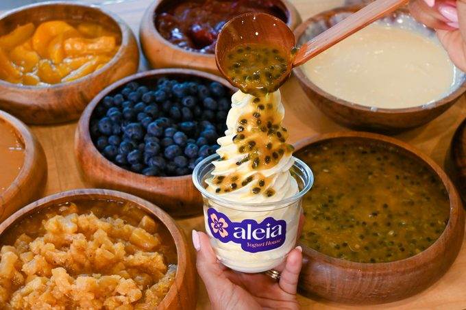 Fresh passion fruit spooned over an aleia frozen yogurt swirl